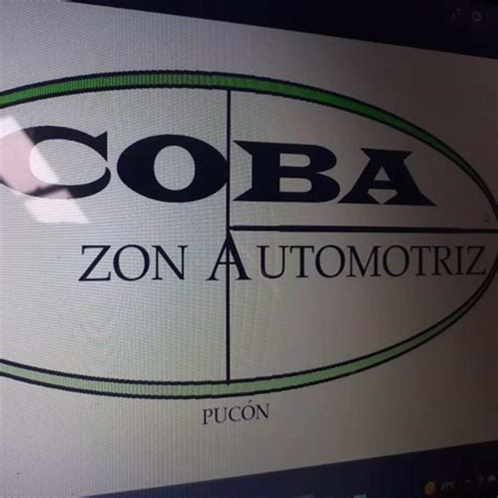 El logo antiguo del taller pintado en la pared.